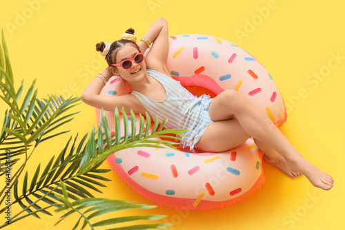 Happy young girl in striped...