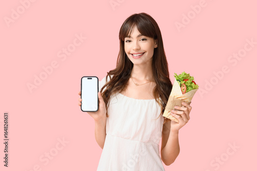 Young woman with tasty sand...