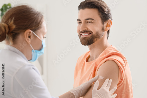 Young man with doctor apply...
