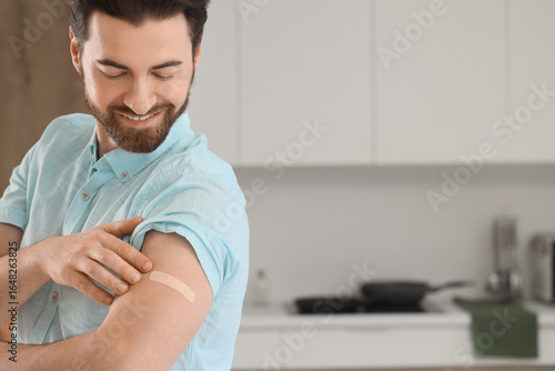 Young man with applied medi...