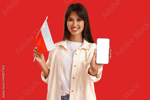 Young woman with flag of Po...