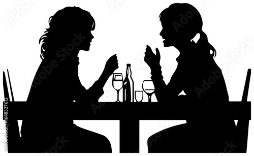Silhouette of Two People Sitting at a Bar Counter