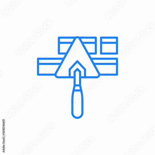 masons trowel in front of a brick wall icon sign vector