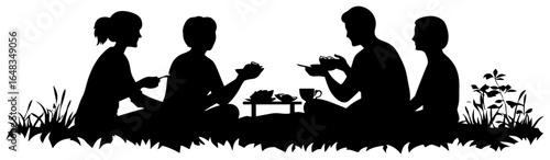 silhouette of group sitting on picnic blanket eating together