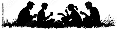 silhouette of group sitting on picnic blanket eating together