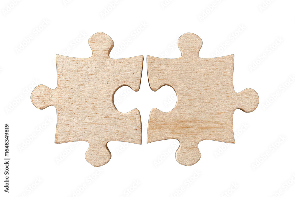 Fototapeta premium Two light-brown wooden puzzle pieces joined