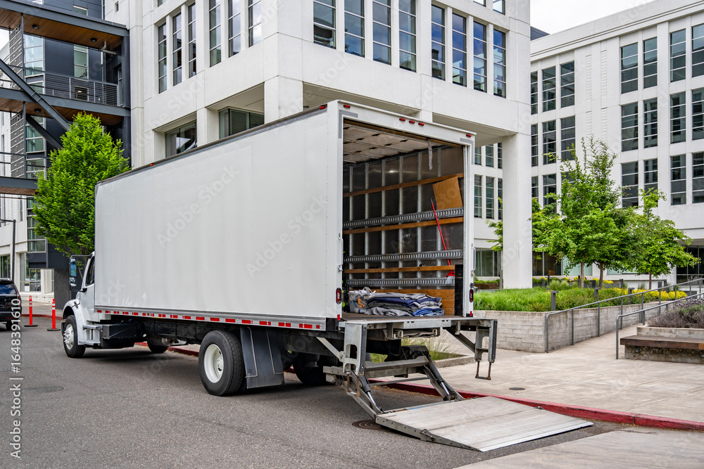 Ταπετσαρία Day cab middle duty white semi truck with open box trailer and lowered lift stan