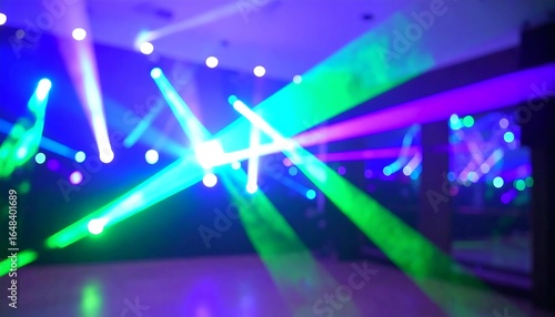 Blurred image of vibrant laser lights crisscrossing a dark room s floor and walls