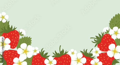 Fresh ripe strawberries and delicate white flowers bordering a soft green background