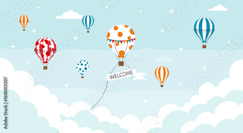 Beautiful sky filled with colorful hot air balloons and fluffy clouds welcoming the viewer
