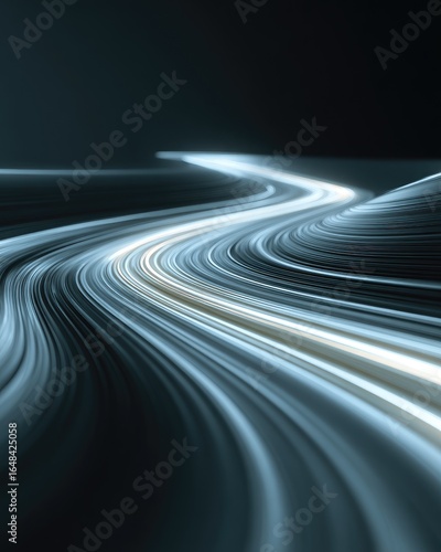 Abstract light trails curving through dark space