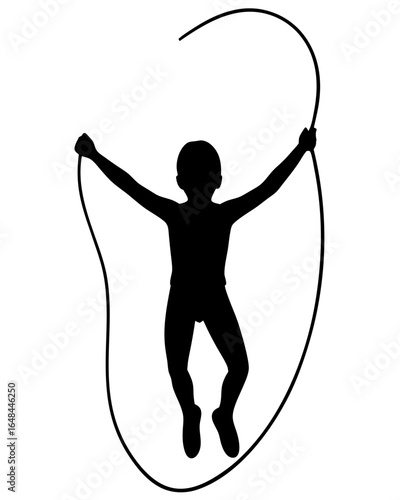 Active child silhouette joyfully jumping rope outdoors for fitness and playful childhood fun