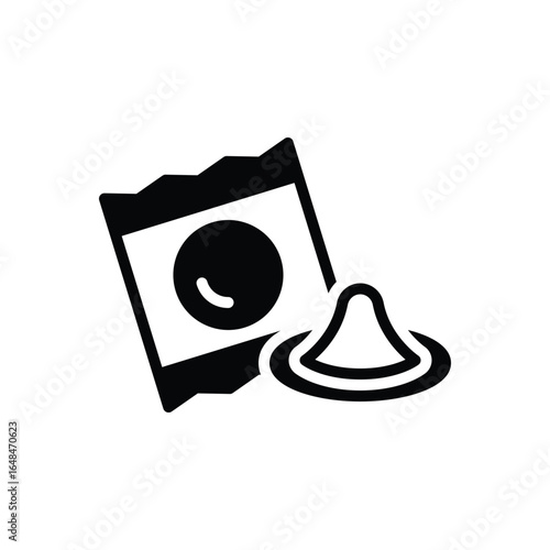Black solid icon for condom