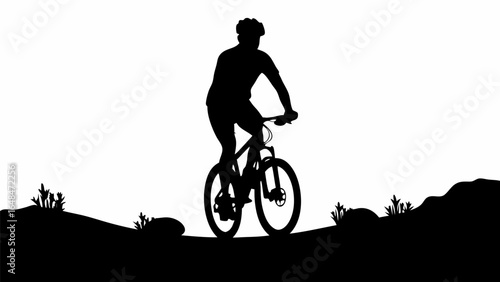Silhouette of a cyclist riding a mountain bike on a trail with vegetation and hilly terrain in the background