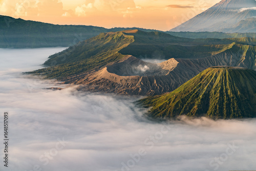 Ethereal volcanic craters above a sea of morning fog