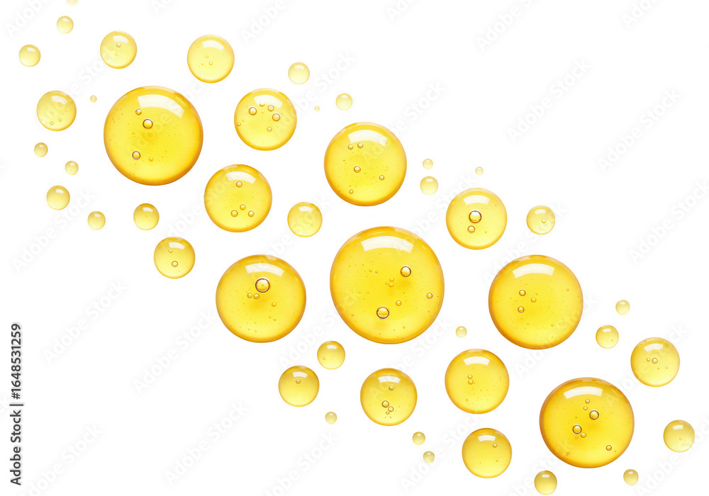 Fototapeta premium Yellow liquid drops isolated on transparent background