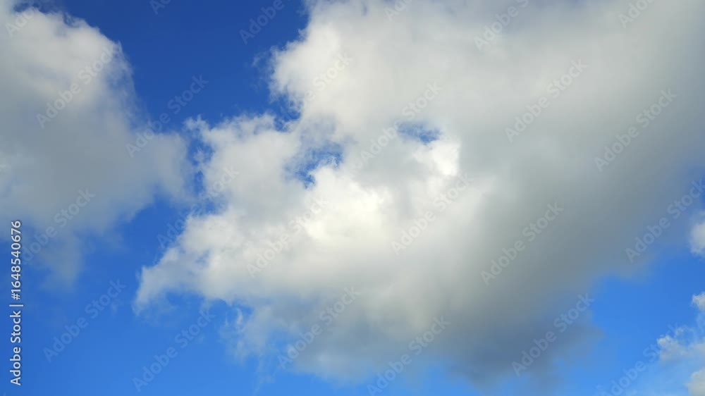 Sky time-lapse photography, rapid movement of white clouds Sky time-lapse photography, rapid movement of white clouds