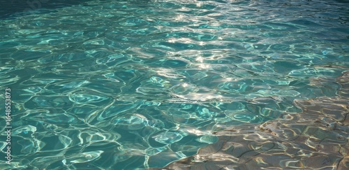 Rippled teal pool water