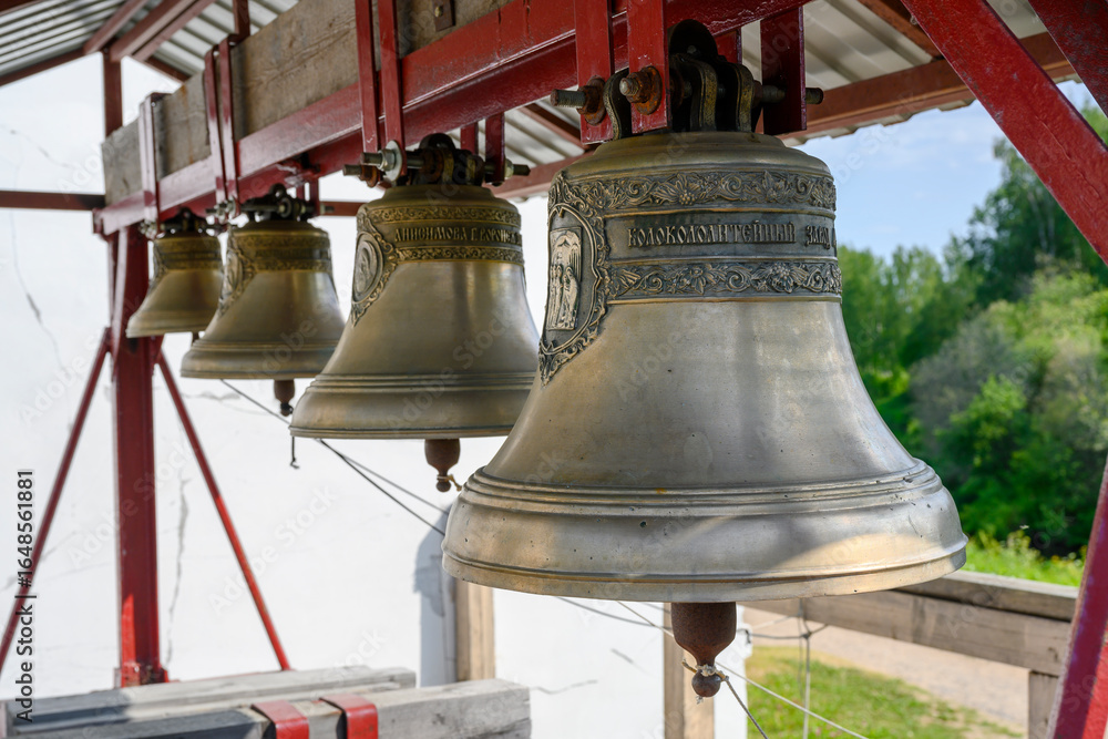 Obraz premium A close-up view of the bells of the Cathedral of Our Lady of Smolensk in Olonets, Karelia