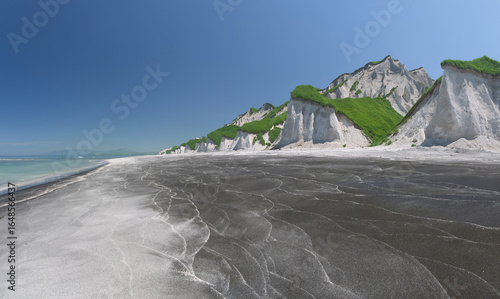 White Cliffs natural wonder on the very long black sand beach
