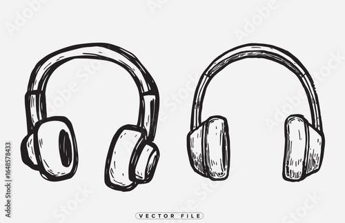 A pair of black and white headphones on a plain background