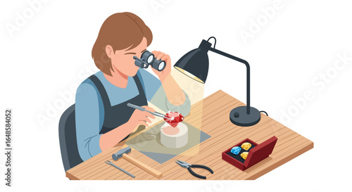 Female jeweler in an apron examining a sparkling red gemstone with loupe glasses and tweezers at her workbench.