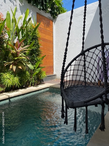 swinging chair in a pool
