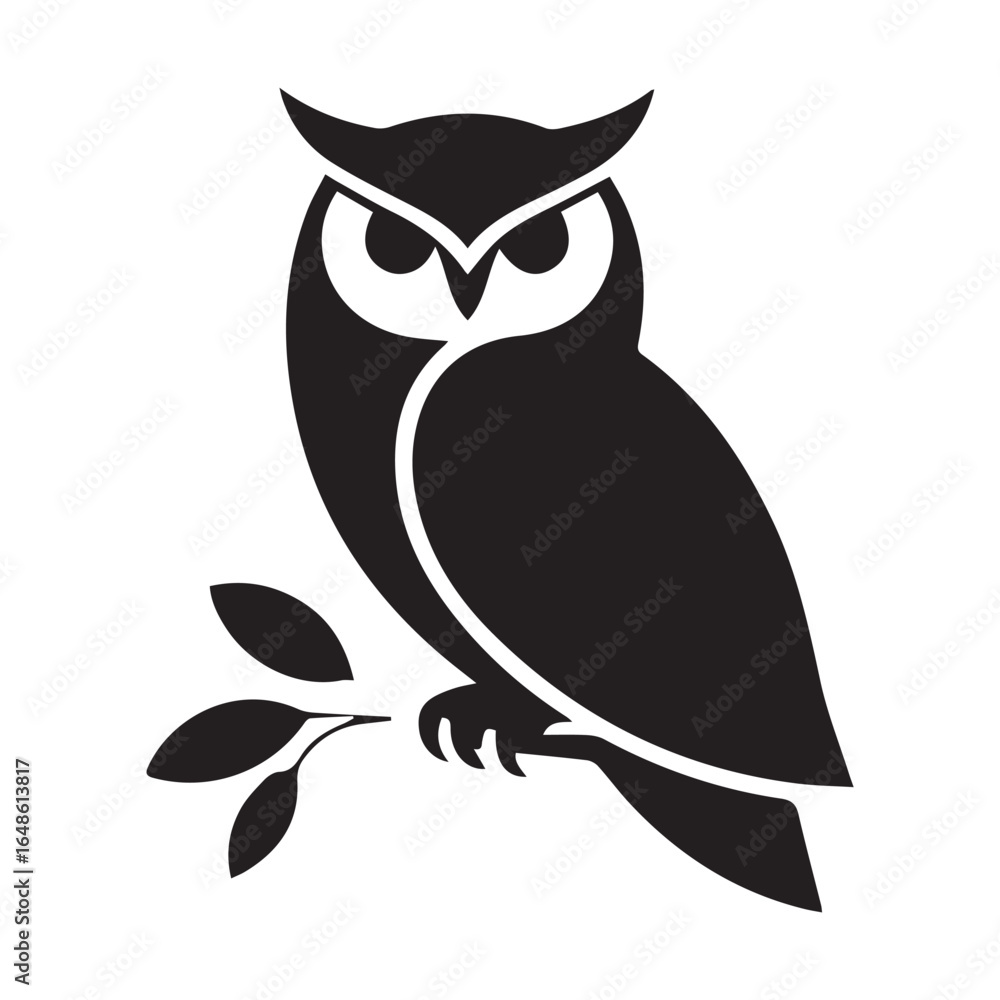 Obraz premium owl sitting on branch
