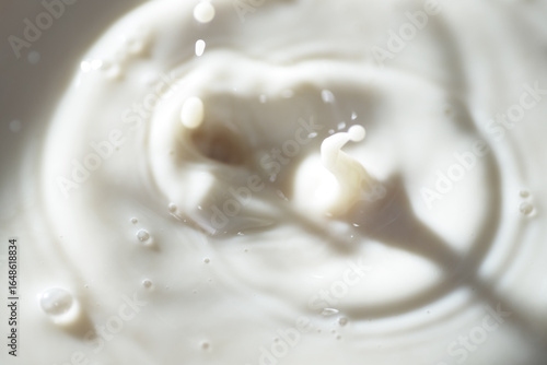 Close up shot of cow milk splash as background