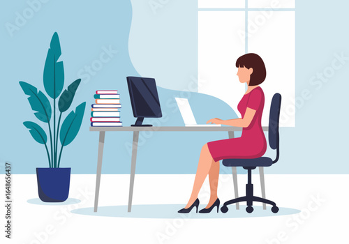 Woman Working at Desk with Laptop and Computer