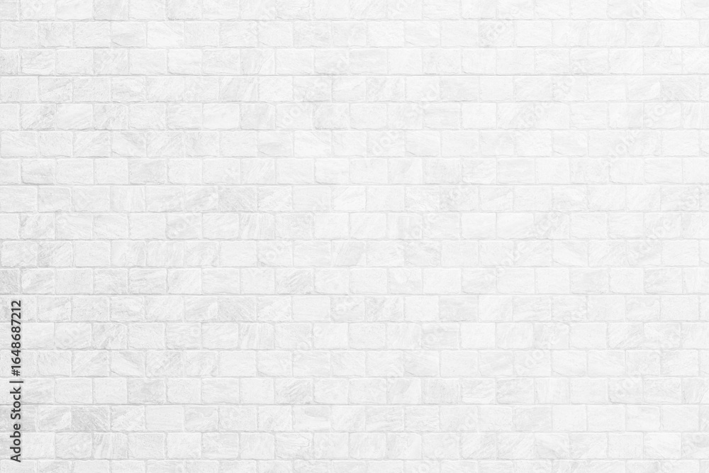 Fototapeta premium Kitchen wallpaper concept: Close up modern white brick tiles wall texture background, White brick wall texture background for stone tile block in grey light color wallpaper modern interior.