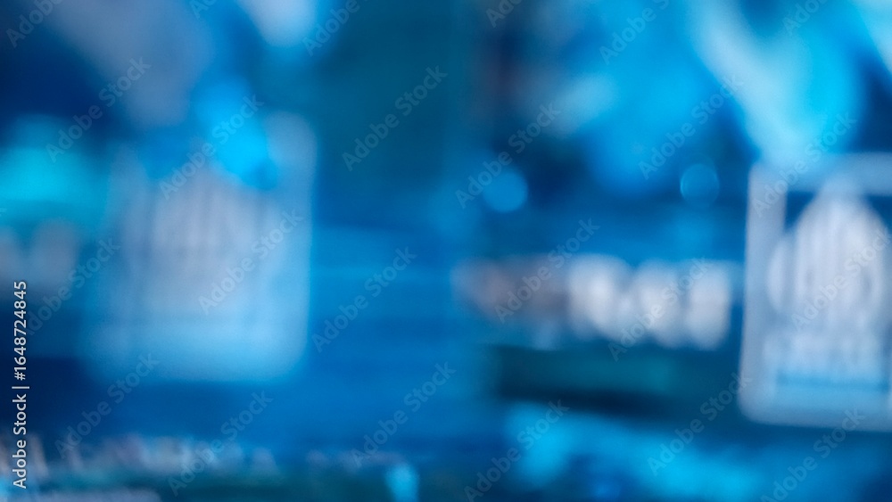 Fotografie The image shows a blurry blue plastic surface, creating an abstract and indistinct pattern