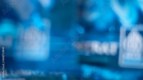 фотографія The image shows a blurry blue plastic surface, creating an abstract and indistinct pattern