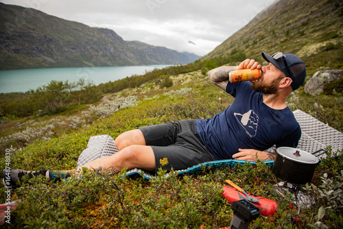 Man drinking beer from a can