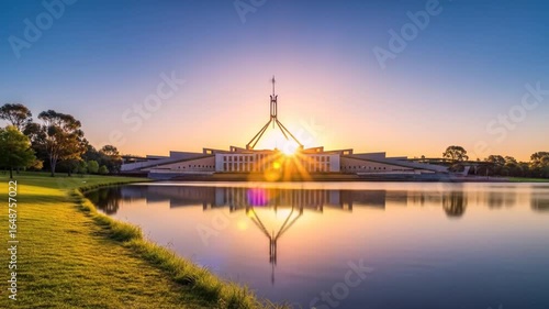 Serene Australian Parliament House View Reflecting on Water During Colorful Sunset
