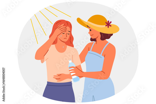 Woman who suffered sunstroke in hot weather stands near friend with bottle of water in hands. Sunstroke caused dizziness and disorientation in girl accustomed to cold climate and low temperatures