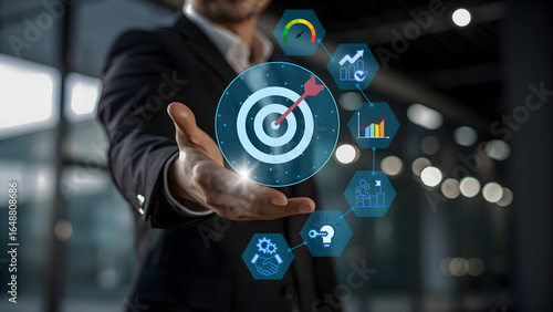 Business man shows market targets and achievements 