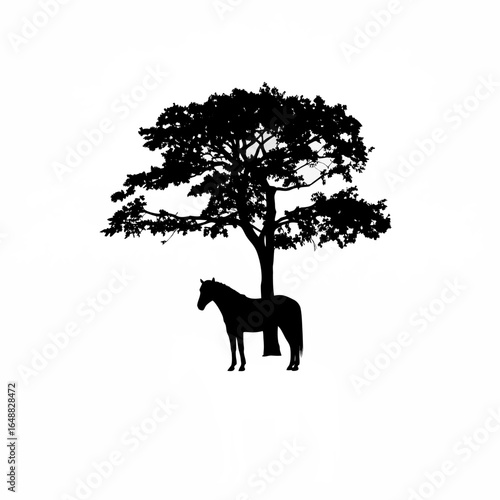 Serene horse resting peacefully under a large majestic tree