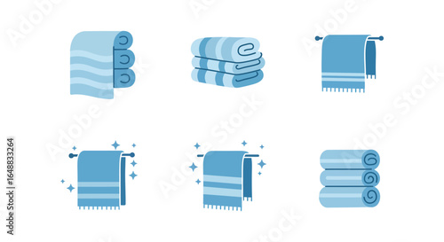 Collection of Blue Towels Stacked Hanging and Rolled for Bathroom Decor