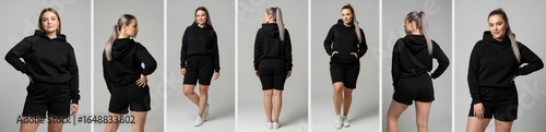 Stylish Young Woman in Black Hoodie and Shorts Posing in Studio Environment