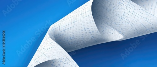 Curled blueprint paper against a vibrant blue background