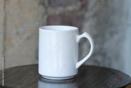 cup of coffee on wooden table