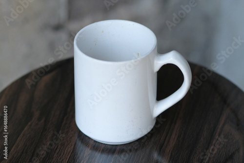 cup of coffee on wooden table