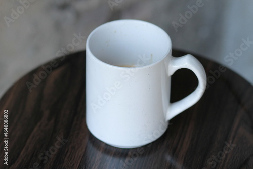 cup of coffee on wooden table