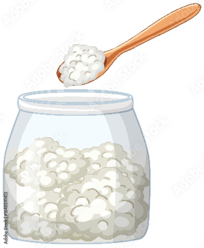 Wooden Spoon Scooping Kefir Grains from Glass Jar
