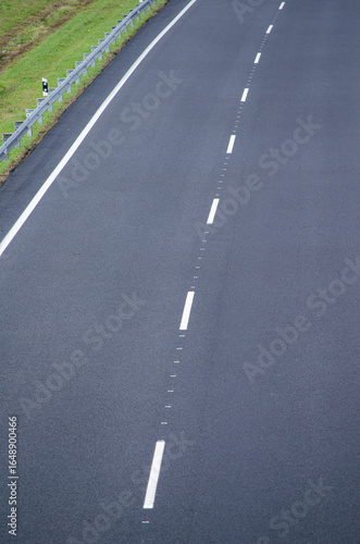 Wallpaper Mural A clean and new highway with a guardrail, a theme of safety and infrastructure. Torontodigital.ca