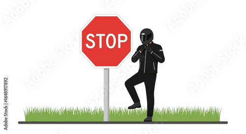 Biker With Attitude Posing Next To A Stop Sign On The Roadside