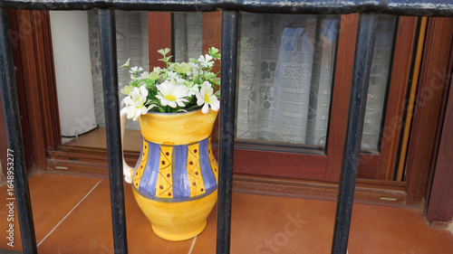 Colorful jug with wild flowers