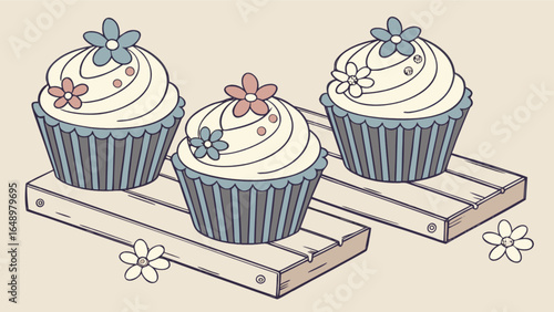 Delicious cupcakes with frosting and flowers on a wooden tray perfect for bakery shop display
