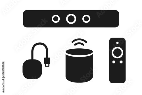 Home audio system components displayed on a plain background showcasing speakers and connection devices for setup